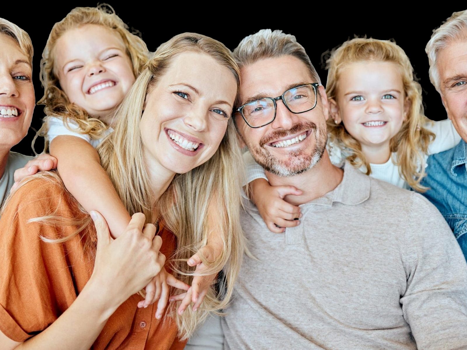 Smiling multi-generation family — patients of Smile Makers of Georgia in Alpharetta