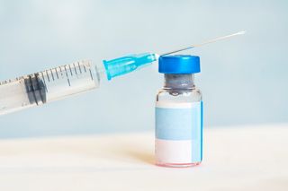 Medicine vial and syringe